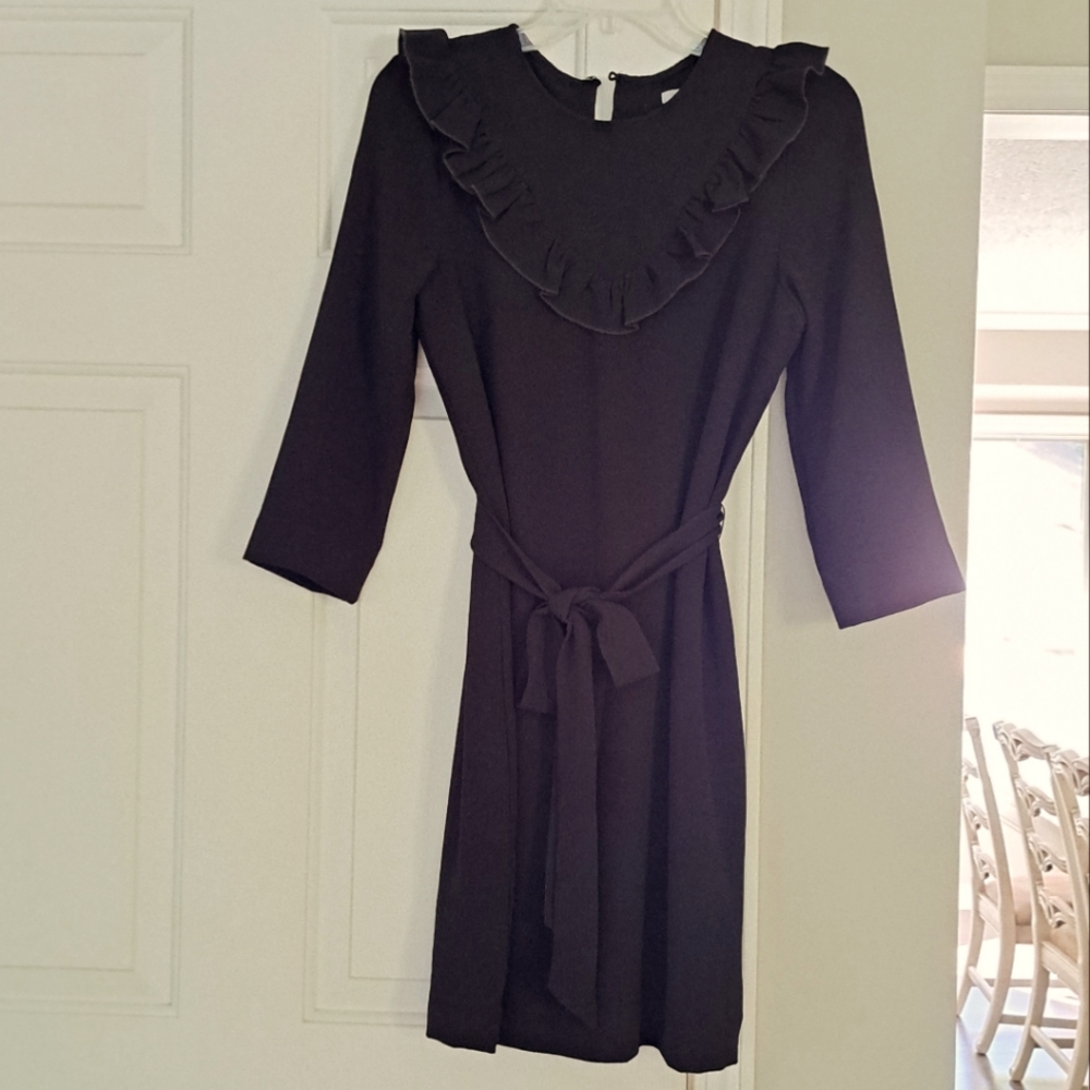 H&M black ruffle lined dress. Size 6.